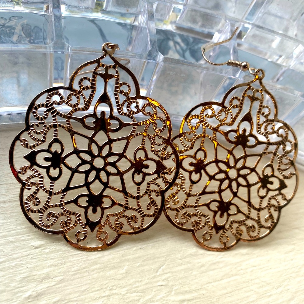 Rose gold earrings.